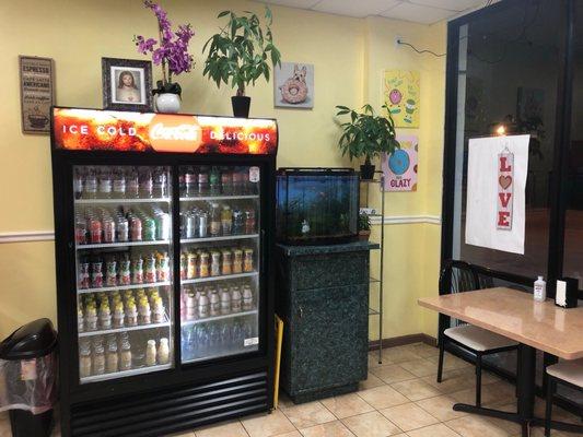 Beverages and a cute little aquarium.