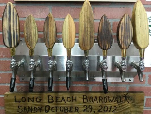 Our tap handles were carved from a piece of Boardwalk that was destroyed by Hurricane Sandy.