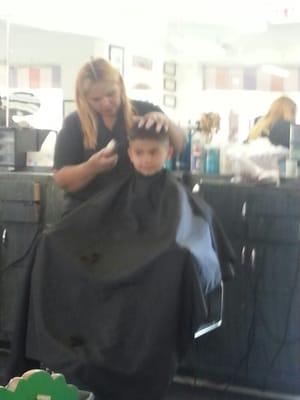 Alex getting a haircut