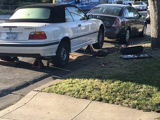 My street became an exhaust repair shop. This cars been like this for 4 days. WTH.