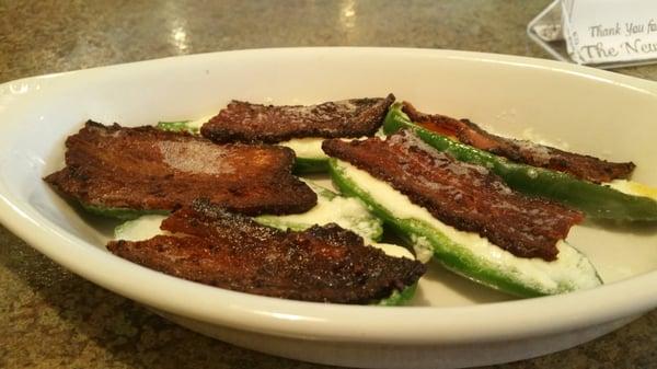 Jalapeño poppers with bacon strip appetizer