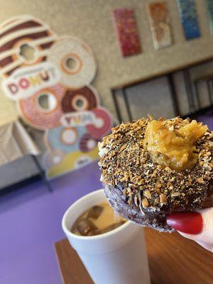 German chocolate cake donut with ice coffee