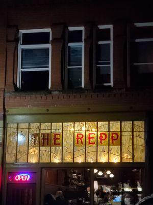 The gorgeous front window of this restaurant, which is especially breathtaking after dark