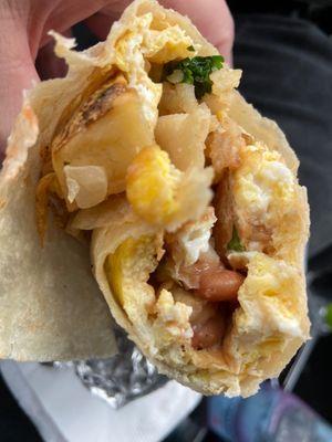 Potato and egg breakfast burrito is good. The salsa is awesome