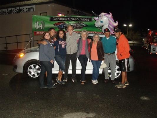 Happy Family purchasing a car for their sweet daughter!