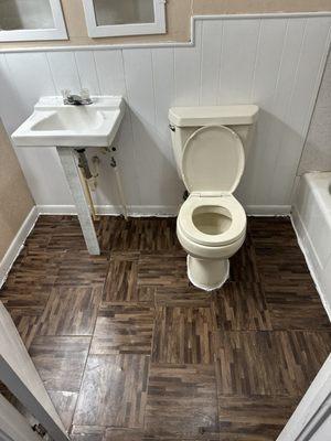 Restroom flooring & installment of toilet