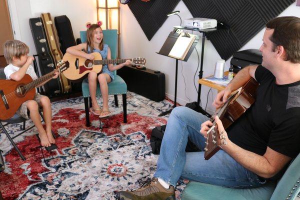 Landon Mattox teaching an Acoustic Guitar Lesson