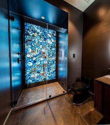 Vanderbilt Project: Contemporary bathroom design featuring an LED backlit agate stone slab.