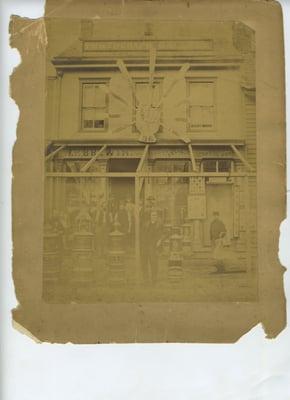 Original photo of clients Uncle in front of his business 1885