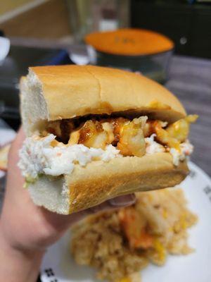 Half a cajun crawfish sandwich.