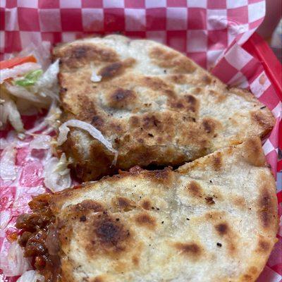 It's like a quesadilla with trompo bistek & cheese and the sandia agua so delicious. Recommend highly and very reasonably priced.