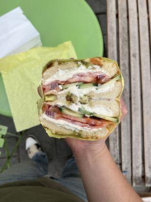 Lox bagel sandwich, close faced, pesto cheese bagel, $9.