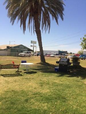 Bbq and seating area for guests