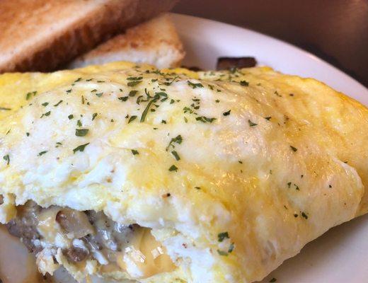 Smoked steak, mushroom, onion, & cheese omelet