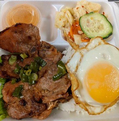 #35... Grilled pork chop with sunny side egg