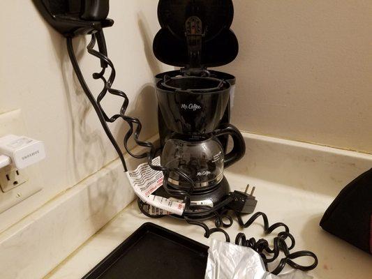 Coffee pot, no coffee or cups