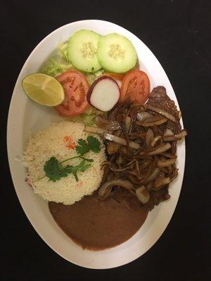 Bistec encebollado