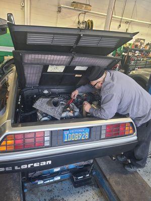 Repairs needed to the Flux capacitor. So that we can send them....
Back to the Future.