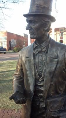 "Out of Court" - Statue of Abraham Lincoln and Melissa Goins by John McClarey in Village Square across from the Courthouse