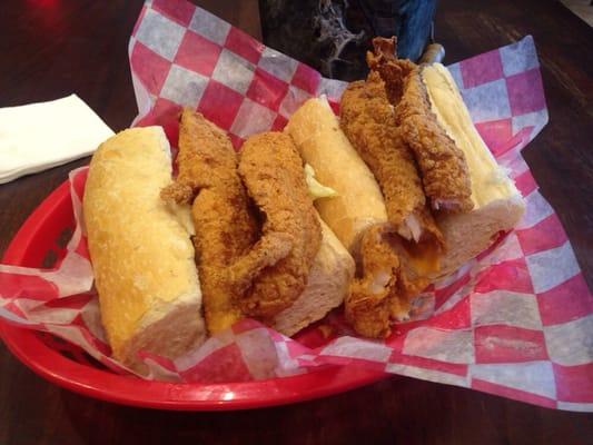 Fried fish dressed with cheese