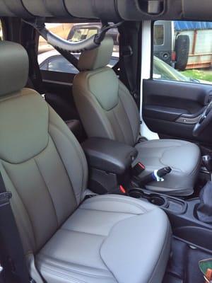 Pewter colored leather with black stitching and the sporty perforated center pieces. LVE my Jeep even more now.