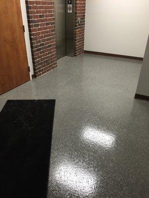 Epoxy coating in an entryway for a commercial building.