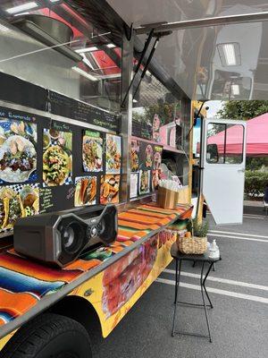 Food truck, you can see a little eating area in the back of the photo