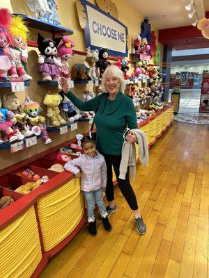 A whole big wall of stuffed animals to choose from