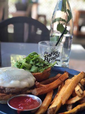 Duck burger with freshly fried fries and secret homemade ketchup.