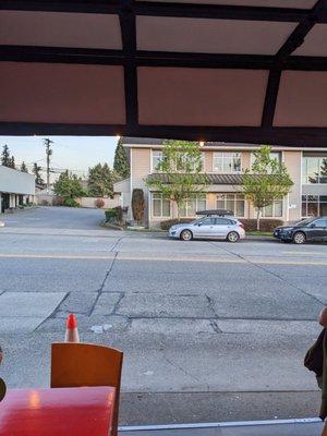 Cute garage door with a view of 6th Ave.