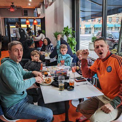 Family enjoying a soccer game at The Fox. Go NYCFC!