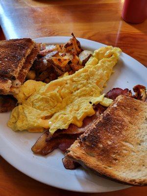 #3 special. 2 eggs, bacon, homefries and toast.