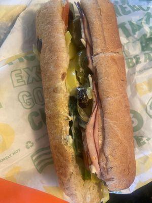 Delicious ham cheese lettuce, spinach, pickles, olives, banana peppers, tomatoes, delicious