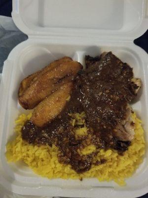 Jerk chicken lunch for 5.99 with yellow rice n gravy. You get one side but I am counting calories so I didn't get it