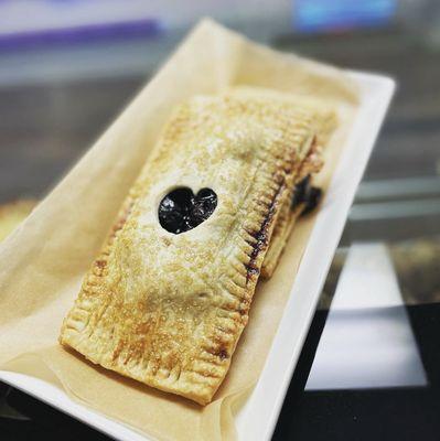 Cherry hand pies. Flaky pie crust, house made dark cherry filling.