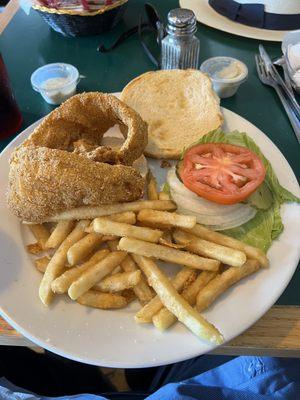 Walleye sandwich with corn meal breading. It is very very good. Reminded me of the fish stands in the old days