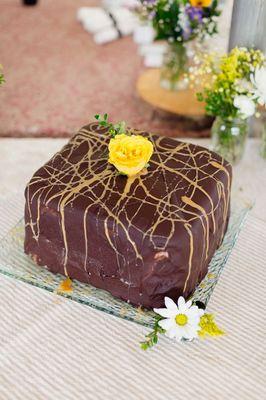 Chocolate ganache covered salted caramel chocolate cake