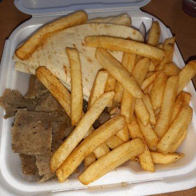 Gyro platter with fries. There's a lot of meat, it's just under the fries.