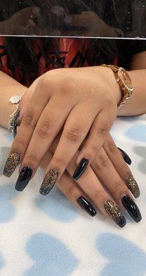 Black and gold nails