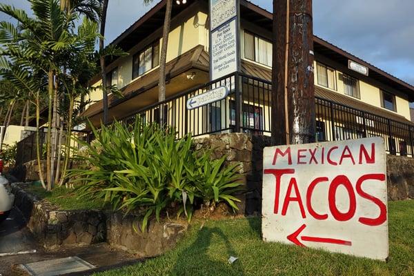 Easy to miss.  Look for this TACOS sign along the highway.