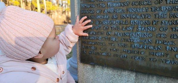 The most perfect granddaughter in the world checking out the Bennett Place plaque