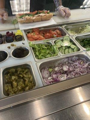 Sandwich line had toppings that were all mixed together