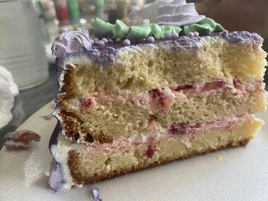 Three layer tres leche cake with fresh strawberries