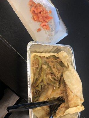 Veggie burrito ordered with no cheese, no sour cream and no tomatoes