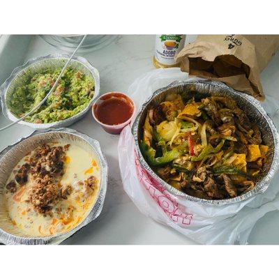 Guacamole, Queso Chorizo and Texas Nachos (shrimp &steak) with Chips and salsa