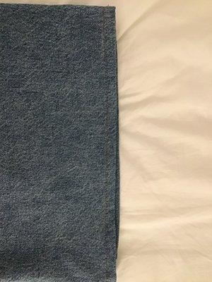 Regular hem on the bottom of left leg - uneven.