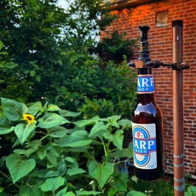 Love the beer tiki torches on the way to the parking lot.