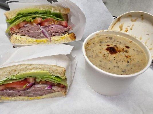 Ham and provolone cold sandwich with a cup of scratch made creamy mushroom bacon soup.