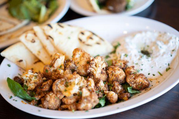 Organic Fried Cauliflower. Served w/pita and tzatziki