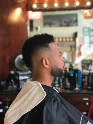 Low cut fade  using the curl sponge to style, beard work w beard color to enhance